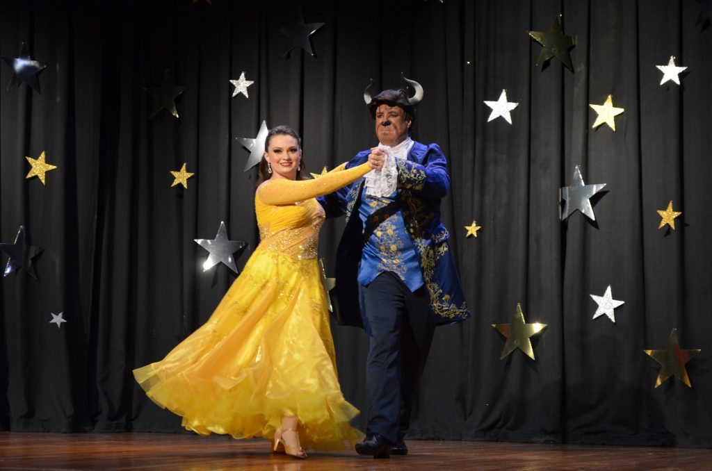 Dancers dressed as the title characters from Disney's Beauty and the Beast strike an impressive pose at the 2019 Dancing with 'Dega Stars event.